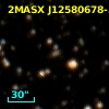 2MASX J12580678-5323153