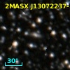2MASX J13072237-5628572