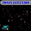2MASX J13571309-7147501