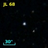 2MASS J21020297-7415497