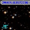 2MASX J13572236-4629080