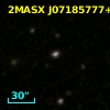 2MASX J07185777+7059209
