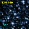 2MASS J01050537-7223589