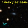 2MASX J19515849-5203084