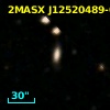 2MASX J12520489-0953432