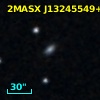 2MASX J13245549+1352322