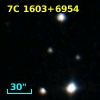 7C 160323.40+695408.00