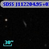 SDSS J112204.95+032959.5