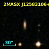 2MASX J12583106+0228312