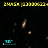 2MASX J13080622+0005414