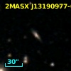 2MASX J13190977-0058159