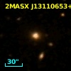 2MASX J13110653+0203148
