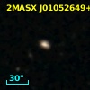 2MASX J01052649+0033110
