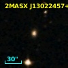 2MASX J13022457+0028366