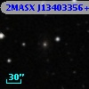 2MASX J13403356+0402583