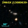 2MASX J13080639-3316305