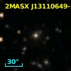 2MASX J13110649-3259336