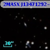 2MASX J13471292-3338410