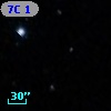 7C 154212.10+702027.00