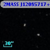 2MASS J12085717+3946440