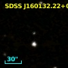 2MASS J16013222+0639033