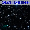 2MASS J19415544+3800457