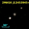 2MASX J12453945+7303184