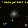 2MASX J07185618+4912440