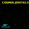 COSMOS J095742.57+022327.9