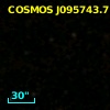 COSMOS J095743.71+022224.7