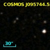 COSMOS J095744.58+013658.9
