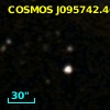 COSMOS J095742.46+013659.5