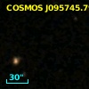 COSMOS J095745.79+013555.8