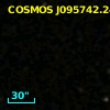 COSMOS J095742.24+013535.4