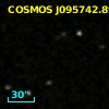 COSMOS J095742.89+013222.7