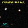 COSMOS J095946.51+014200.5