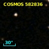 COSMOS J095943.52+014151.9