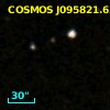 COSMOS J095821.63+014045.4
