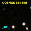 COSMOS J095744.38+014643.0