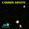 COSMOS J095743.06+014640.7