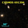 COSMOS J095739.83+014522.9