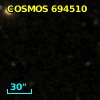 COSMOS J095739.97+014429.5