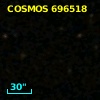 COSMOS J095739.31+014355.8