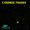 COSMOS J095748.45+014202.2