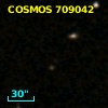 COSMOS J095750.82+014038.5