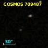 COSMOS J095750.43+014038.3