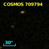 COSMOS J095749.06+014028.3