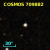 2MASS J09574011+0140416