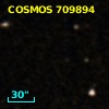 COSMOS J095745.76+014025.5