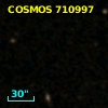 COSMOS J095747.94+014008.5